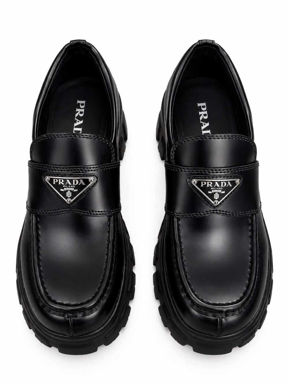 Prada Women’s Black Leather Lug-Sole Loafers